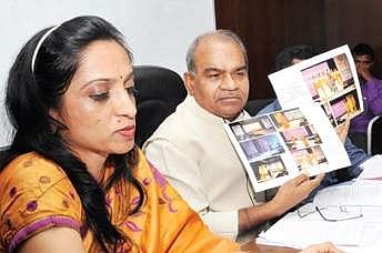 KDA Chairman Prof Siddaramaiah (right) and Director Tourism Dept Dr Manjula N at a meeting in Bengaluru on Tuesday. | Express Photo Service