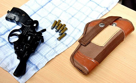 Police recoveres revolver and bullets from a devotee in Tirupati. | Express Photo Service