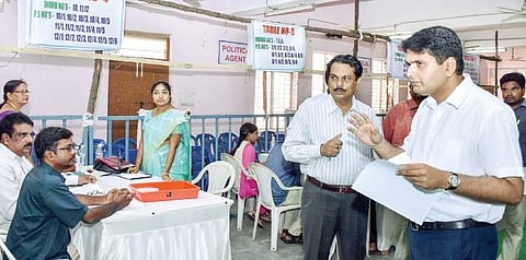 East Godavari collector and returning officer Kartikeya Mishra, along with the officials, inspects the arrangements for counting of votes polled during the KMC elections at Rangaraya Medical College in Kakinada on Thursday | Express