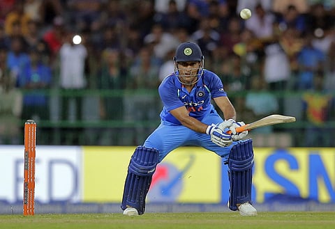 India's Mahendra Singh Dhoni plays a shot during their fourth one-day international cricket match against Sri Lanka in Colombo, Sri Lanka.|AP