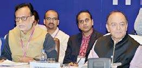 Finance Minister Arun Jaitley (R) and revenue secretary Hasmukh Adhia (L) speaking after the GST Council meeting held in Hyderabad on Saturday | PTI