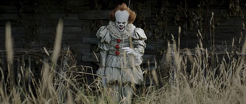 This image released by Warner Bros. Pictures shows Bill Skarsgard in a scene from 'It'. | AP