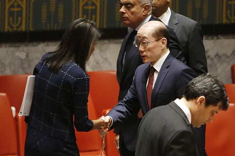United States Ambassador to the United Nations Nikki Haley speaks to China's U.N. Ambassador Liu Jieyi after a vote to adopt a new sanctions resolution against North Korea during a meeting of the U.N. Security Council. (Photo | AP)