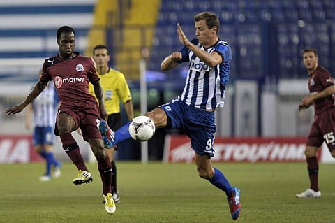 Finnish striker Njazi Kuqi (R) | AFP