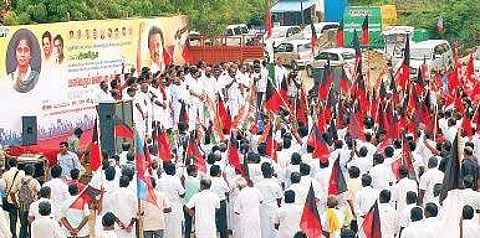 Cadre of DMK and alliance parties staging a demonstration against NEET in Pudukkottai town on Wednesday;