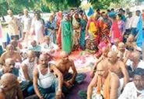 Families displaced by the Sardar Sarovar Dam project protest by shaving off their heads in Bhopal, Madhya Pradesh, on Thursday | Express