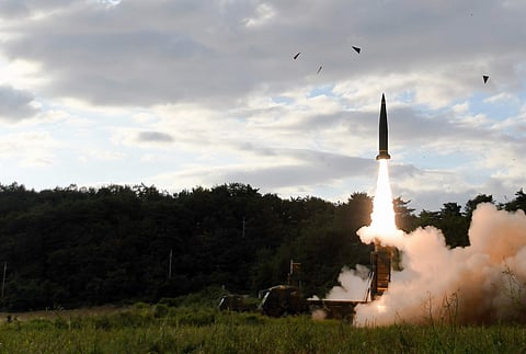 Acting in response to North Korea's missile launch, in this photo provided by South Korea Defense Ministry, South Korea's Hyunmoo II ballistic missile is fired during an exercise at an undisclosed location in South Korea. | AP