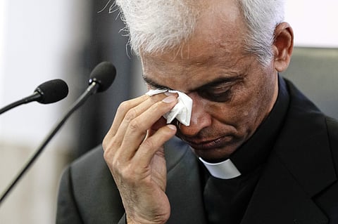 Father Tom Uzhunnalil wipes tears from his eyes after a moment of commotion during a press conference on his recent rescue from Yemeni militants, in Rome. (AP)