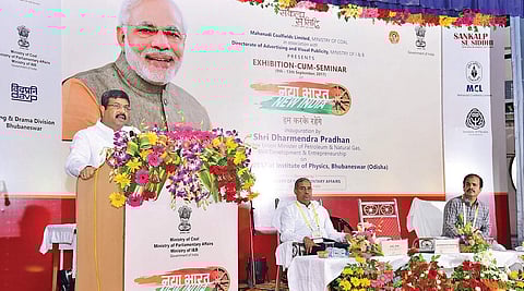 Petroleum Minister Dharmendra Pradhan addressing a gathering.