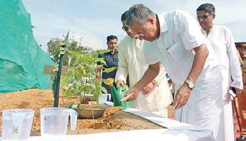 Chief Minister Pinarayi Vijayan planting a sapling at the foundation stone laying function of SunTec Campus at Technocity in Thiruvananthapuram | Express