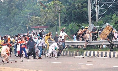 Followers of Gurmeet Ram Rahim Singh clashing with the police in Panchkula after his conviction