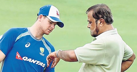Steve Smith with Eden Gardens chief pitch curator Sujan Mukherjee | PTI