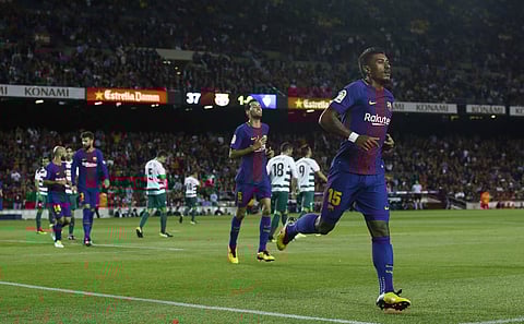 FC Barcelona's Paulinho reacts after scoring during the Spanish La Liga soccer match between FC Barcelona and Eibar at the Camp Nou stadium in Barcelona, Spain. | AP