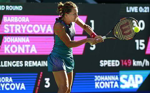 Barbora Strycova of the Czech Republic returns a shot to Johanna Konta of Britain during their second round match of the Pan Pacific Open tennis tournament in Tokyo. | AP