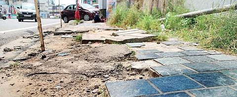A dilapidated footpath near North Overbridge