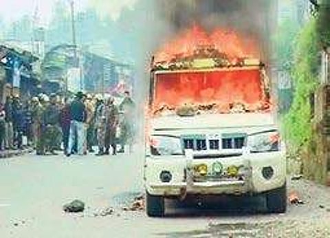 A vehicle that was set on fire by angry protesters in Darjeeling town.(File photo | Express)