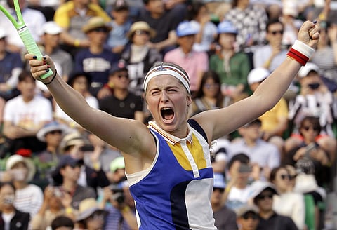Jelena Ostapenko of Latvia celebrates after defeating Beatriz Haddad Maia of Brazil during their final match at the Korea Open tennis championship in Seoul. (AP)