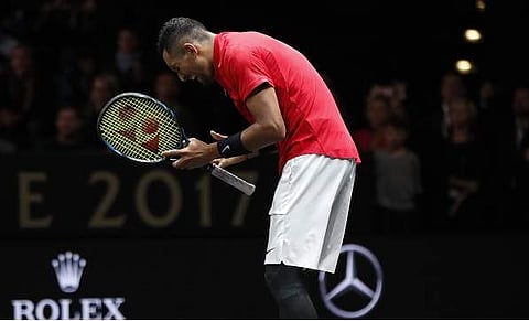 Nick Kyrgios denied that his kneeling down gesture before his Laver Cup clash against Roger Federer was part of similar protests against US President Donald Trump. (AP)
