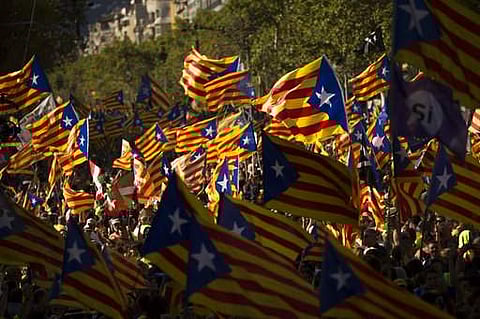 Scotland lawmakers are increasingly vocal in condemning Spain's actions and a group of volunteers is heading out to help. (AP)