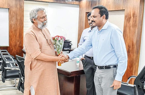 Waterman of India Rajendra Singh with APCRDA Commissioner Ch Sreedhar in Vijayawada | Express
