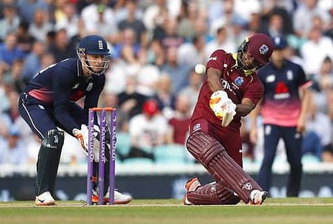 West Indies' Evin Lewis plays a shot off the bowling of England's Moeen Ali during the One Day International cricket match between England and the West Indies at the Oval cricket ground. | AP
