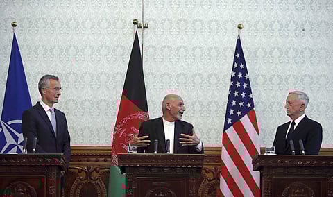 Afghan President Ashraf Ghani, center, speaks during a press conference with U.S. Defense Secretary Jim Mattis, right, and NATO Secretary General Jens Stoltenberg at the presidential palace in Kabul on Sept. 27, 2017. (Photo | AP)