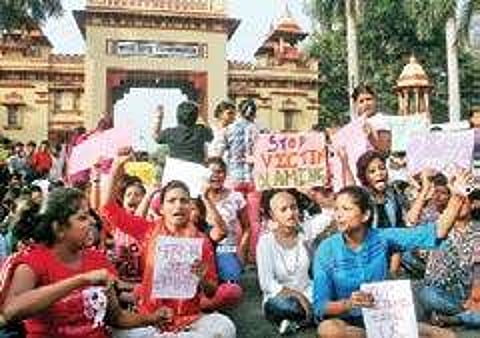 Students of the Banaras Hindu University during a protest against the molestation of a student inside the campus, in Varanasi | PTI