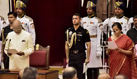 Nirmala Sitharam being administered the oath of office at Rashtrapati Bhavan as part of the cabinet reshuffle on Sunday. (PTI)