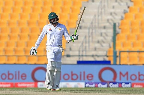Azhar Ali of Pakistan reacts after scoring a half century during the third day of the first Test cricket match between Pakistan and Sri Lanka. (Photo | AFP)