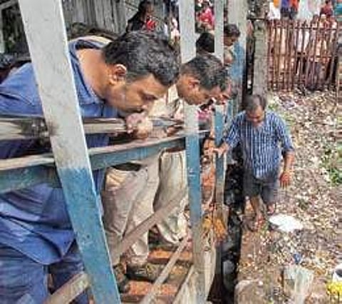 People at the site of the stampede at the Elphinstone railway station | PTI