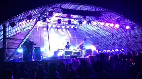 Visitors listen to music participants performing at the Ziro Festival of Music at Ziro Valley in Lower Subansiri district of Arunachal Pradesh on Friday. | Aishik Chanda