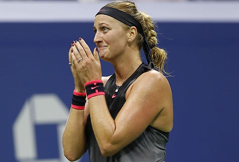 Petra Kvitova, of the Czech Republic, reacts after defeating Garbine Muguruza, of Spain, 7-6 (3), 6-3, in straight sets in their fourth-round match at the U.S. Open tennis tournament. | AP