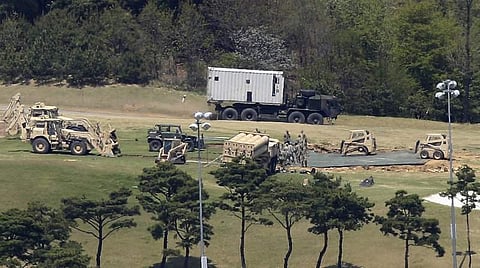U.S. Army soldiers install THAAD at a golf course in South Korea. | AP