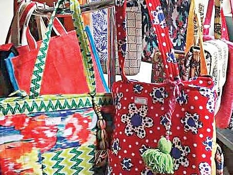 The bags made out of donated waste clothes