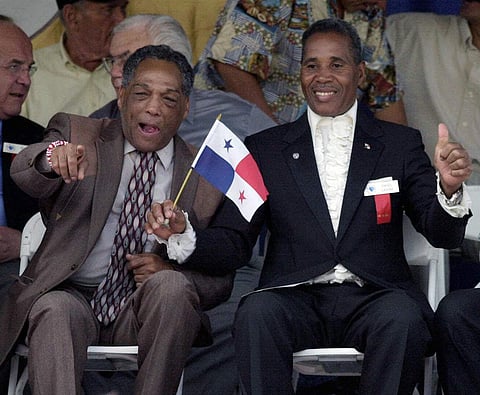In this June 10, 2001, file photo, International Boxing Hall of Fame inductees Sugar Ramos of Mexico, front left, and Ismael Laguna of Panama, gesture during induction ceremonies in Canastota. | AP