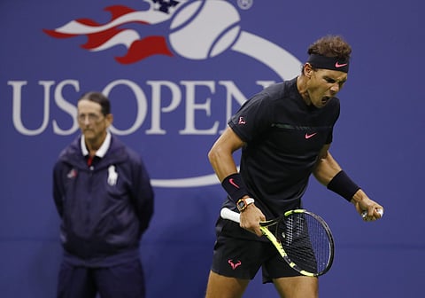 Rafael Nadal, of Spain, reacts after scoring a point against Juan Martin del Potro, of Argentina, during the semifinals of the U.S. Open tennis tournament, Friday. | AP