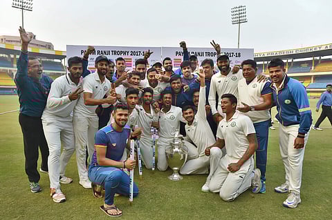 Vidarbha players jubiliate with the trophy after winning the Ranji Trophy | PTI