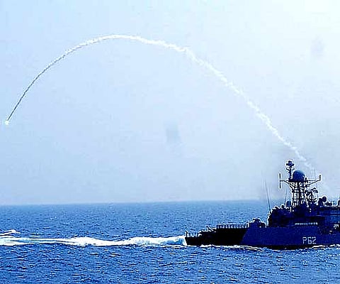 INS Shivalik demonstrating anti-air machine gun firing. (EPS file photo)