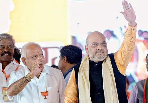 BJP state president B S Yeddyurappa and party national president Amit Shah during the Parivarthana Yatra in Chitradurga on Wednesday| Pushkar V
