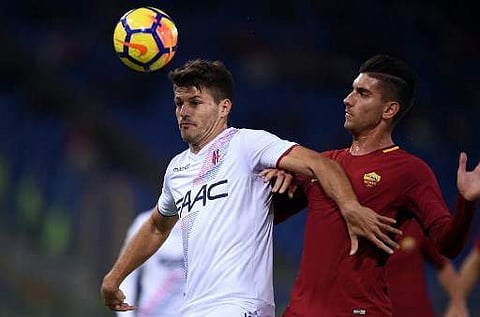 Bologna's Croatian striker Bruno Petkovic (left) in action | Photo: AFP