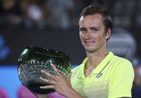 Daniil Medvedev of Russia holds his trophy after his win over Alex De Minaur of Australia | AP