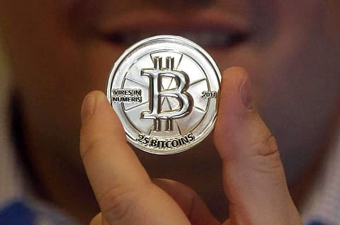 25 Bitcoin token (File | Associated Press)