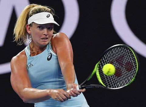United States' CoCo Vandeweghe makes a backhand return to Hungary's Timea Babos during their first round match at the Australian Open tennis championships in Melbourne | Photo: AP