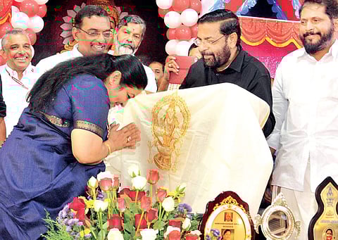 Singer K S Chithra offering prayers before receiving the Harivarasanam Award in Sabarimala on Sunday | SHAJI VETTIPURAM