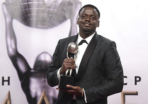 Daniel Kaluuya poses in the press room with the award for outstanding actor in a motion picture for 'Get Out' at the 49th annual NAACP Image Awards