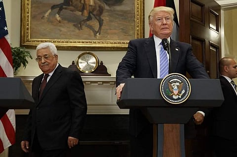 In this May 3, 2017 file photo, President Donald Trump and Palestinian Authority President Mahmoud Abbas arrive in the Roosevelt Room of the White House in Washington. (AP Photo/Evan Vucci, File)