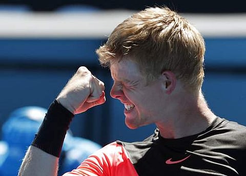 Britain's Kyle Edmund celebrates after defeating Georgia's Nikoloz Basilashvili in their third round match at the Australian Open tennis championships in Melbourne | Photo: AP