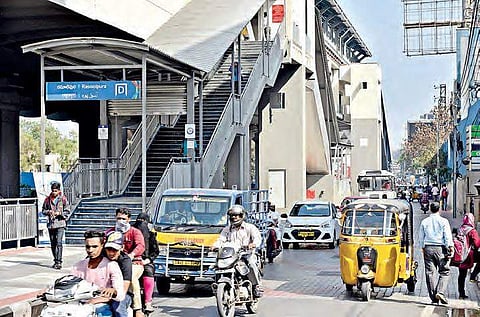 Inadequate space for motorist and no pedestrian crossing at Rasoolpura Metro rail station in Hyderabad, on Thursday| R Satish Babu