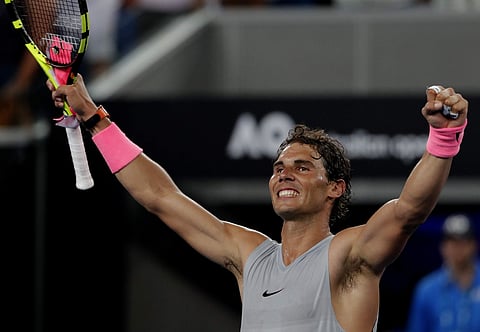 Rafael Nadal celebrates after defeating Damir Dzumhur in their third round match at the Australian Open tennis championships in Melbourne | AP
