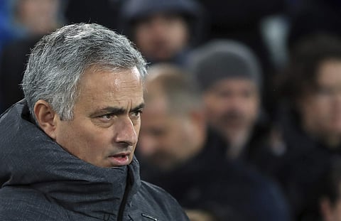 Manchester United manager Jose Mourinho stands on the sidelines, during the English Premier League soccer match between Everton and Manchester United, at Goodison Park. | AP
